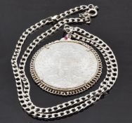 A silver Maria Theresa coin in pendant mount, on silver chain, 46.4g