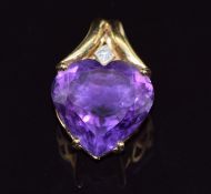An 18ct gold pendant set with a heart cut amethyst and a diamond, 7.8g, 2.8 x 1.8cm