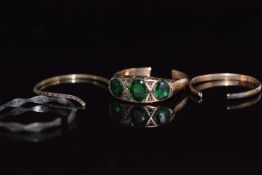 A section of 9ct gold ring (1.8g) and three other sections of rings