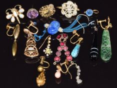 A collection of single earrings including Victorian, jade, agate, garnet, coral, diamond, opal, etc