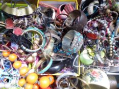 A collection of costume jewellery including bangles, necklaces, etc