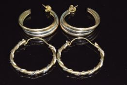 Two pairs of 9ct gold bi-coloured hoop earrings, 14.9g