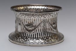 George V Irish hallmarked silver potato ring of pierced form with swag and bird decoration, Dublin
