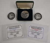 L'Escargot cased silver medal coin, hallmarked to edge, 66g, together with two 'Silver Stackers