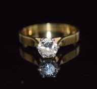 An 18ct gold ring set with a round brilliant cut diamond of approximately 0.6ct, size K, 2.9g