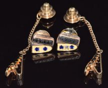 Two yellow metal 'Dowty' pins marked 10k, 4.1g