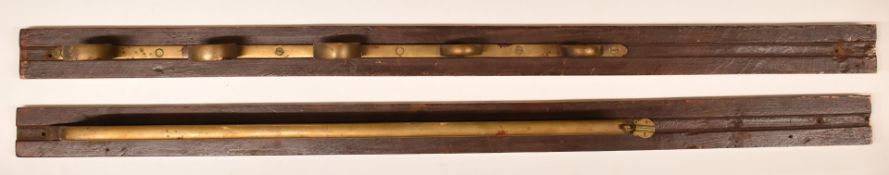 Edwardian oak and brass two part wall mountable gun rack for five guns with miniature brass