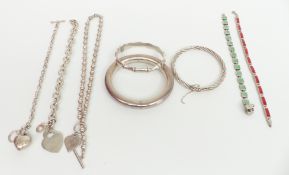 A collection of silver including three bangles, three bracelets and a necklace