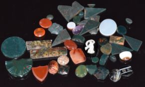 A collection of bloodstone, two tiger's eye scarab beetles, agate, carved examples etc