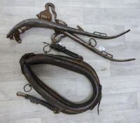 A heavy horse yoke and horse hames