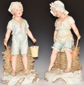 A pair of continental bisque figures of children paddling on a beach, impressed marks verso, H41cm