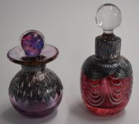 Two glass scent bottles with hallmarked silver overlaid decoration, tallest 10cm