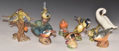 A collection of Royal Worcester, Lladro and other bird figures, tallest 11cm