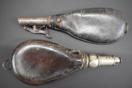 Two leather shot flasks, one Dixon & Sons patent with faux silver hallmarks to the ball and socket