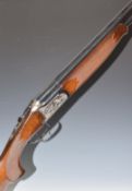 Lanber 12 bore over and under ejector shotgun with engraved scenes of birds to the locks and