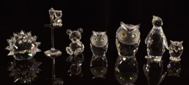 Seven Swarovski figures including owls and a hedgehog, tallest 7cm