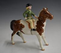Beswick girl on skewbald pony, H15cm