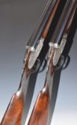 A pair of Gold Sabel 12 bore self-opening sidelock side by side ejector shotguns each with fine