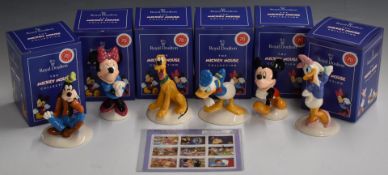 A collection of Royal Doulton Walt Disney 70th Anniversary figures