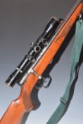 Voere .22 bolt-action rifle with chequered semi-pistol grip, magazine, sight mounts, sling, Nikko