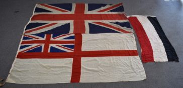White linen Ensign flag together with a linen Union flag, both 130 x 250cm and a German flag with
