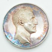 A white metal Duke of Wellington coin / medal with Waterloo verso, diameter 4cm