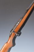 BRNO Model 2 .22 bolt-action rifle with chequered semi-pistol grip, magazine, sight mounts, scope