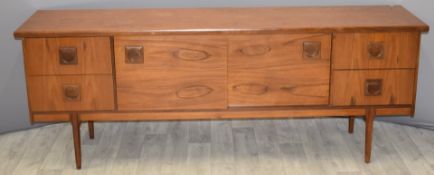 Retro / mid century modern teak sideboard, the central sliding doors flanked either side by two