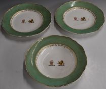 Three 19thC armorial plates with lion and possibly Turkish bust decoration, diameter 26cm