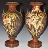 A pair of Watcombe South Devon pedestal twin handled vases decorated with birds and flowers, H34cm