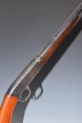 Browning .22 semi-automatic rifle with tube magazine to the stock loaded through wrist, semi-