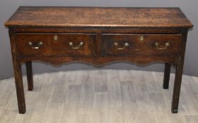Early 19thC country oak sideboard with three drawers and shaped front stretcher, W137 x D46 x H79cm