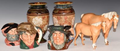 A pair of Royal Doulton Slaters patent pedestal vases, three Royal Doulton character spirit jugs and