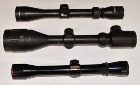 Three rifle scopes comprising Rhino 3-9x50 AO, Tasco Silver Antler 39x40 WA and Simmons Model 1022