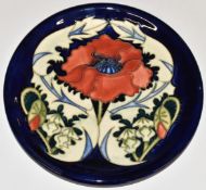 Moorcroft charger decorated in the Poppy pattern, D26cm