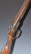 Unnamed English 12 bore side by side hammer action shotgun with engraved lock, hammers, trigger