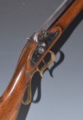 Italian .50 smooth bore percussion hammer action Kentucky style rifle with brass scrolling spurred