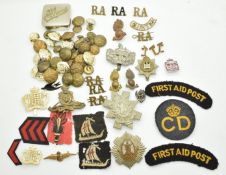 Collection of military badges and buttons including The Royal Scots, Black Watch, Royal Artillery,