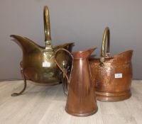 Two coal scuttles, brass and copper, one Art Nouveau and a copper jug, tallest 48cm
