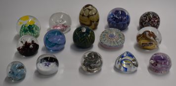Fifteen glass paperweights including Caithness, Mdina, Alum Bay and Isle of Wight.
