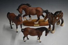 Four Beswick horses comprising Spirit of Earth, Swish Tail, Mare Facing Right and Standing Shire