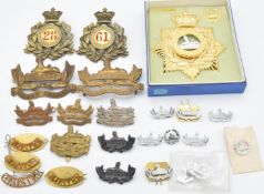 Small collection of badges for the Gloucestershire Regiment