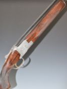 Browning B25 Diana 12 bore over and under ejector shotgun with engraved scenes of bird to the