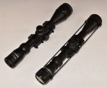 Two Nikko Stirling Mountmaster 3-9x40 rifle scopes.