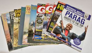 Fourteen volumes of Gun and Militaria Mart, Guns & Hunting and Shooting Times.