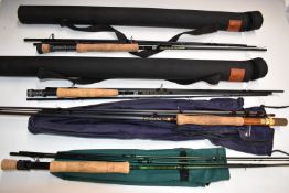 Four fly fishing rods including two Fulling Mill four piece 9ft #5, World Class FM-GX Gold Fly