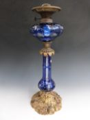 Victorian overlay cut glass oil lamp by Hinks and Sons Birmingham, the glass by Stevens and