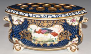 A 19thC porcelain bough pot with peacock decoration, H9.5cm