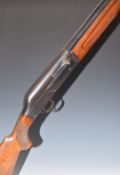 Breda 12 bore four-shot semi-automatic shotgun with chequered semi-pistol grip and forend, vented
