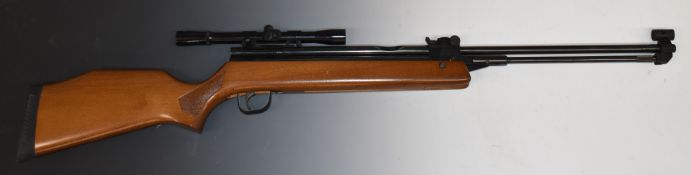 Stirling Armament Co .22 air rifle with chequered semi-pistol grip, adjustable sights and 4x20
